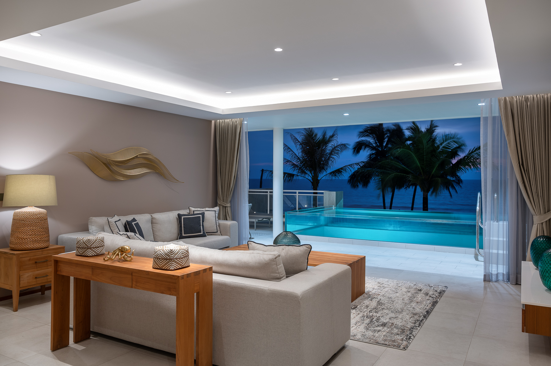 รูปของ การออกแบบตกแต่งภายใน สำหรับ อพาร์ทเมนท์หรูริมชายหาด ใน Angsana Beach Front 2